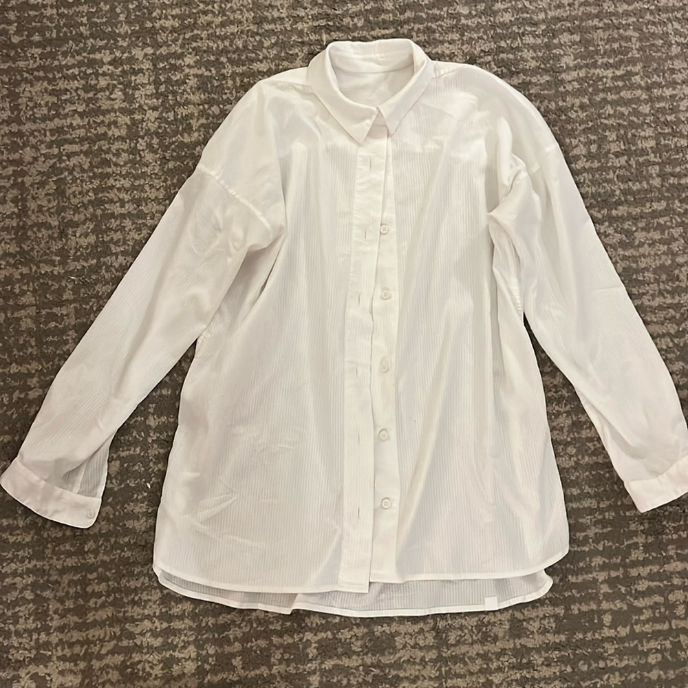 Women’s Lululemon dress shirt size 10.